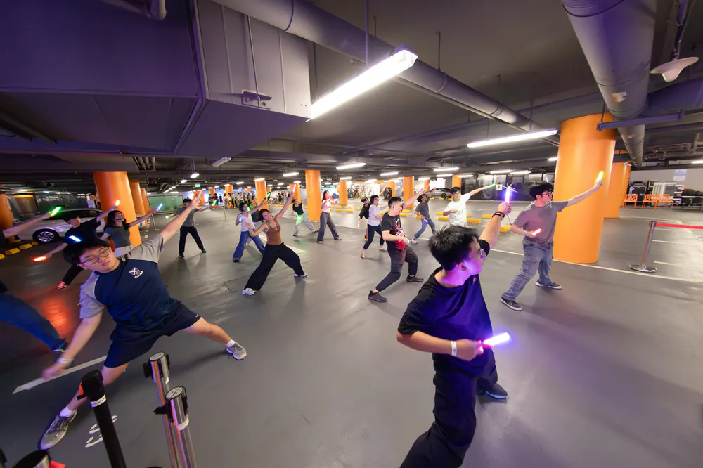 Lightsaber dance workshop in the *SCAPE car park, Level 1